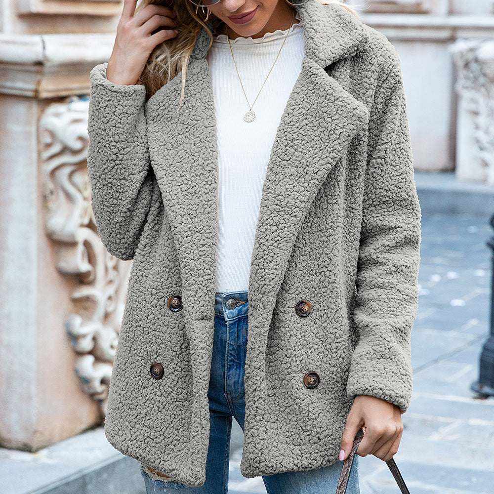 woman wearing gray fluffy coat winter jacket with double-breasted buttons outdoors