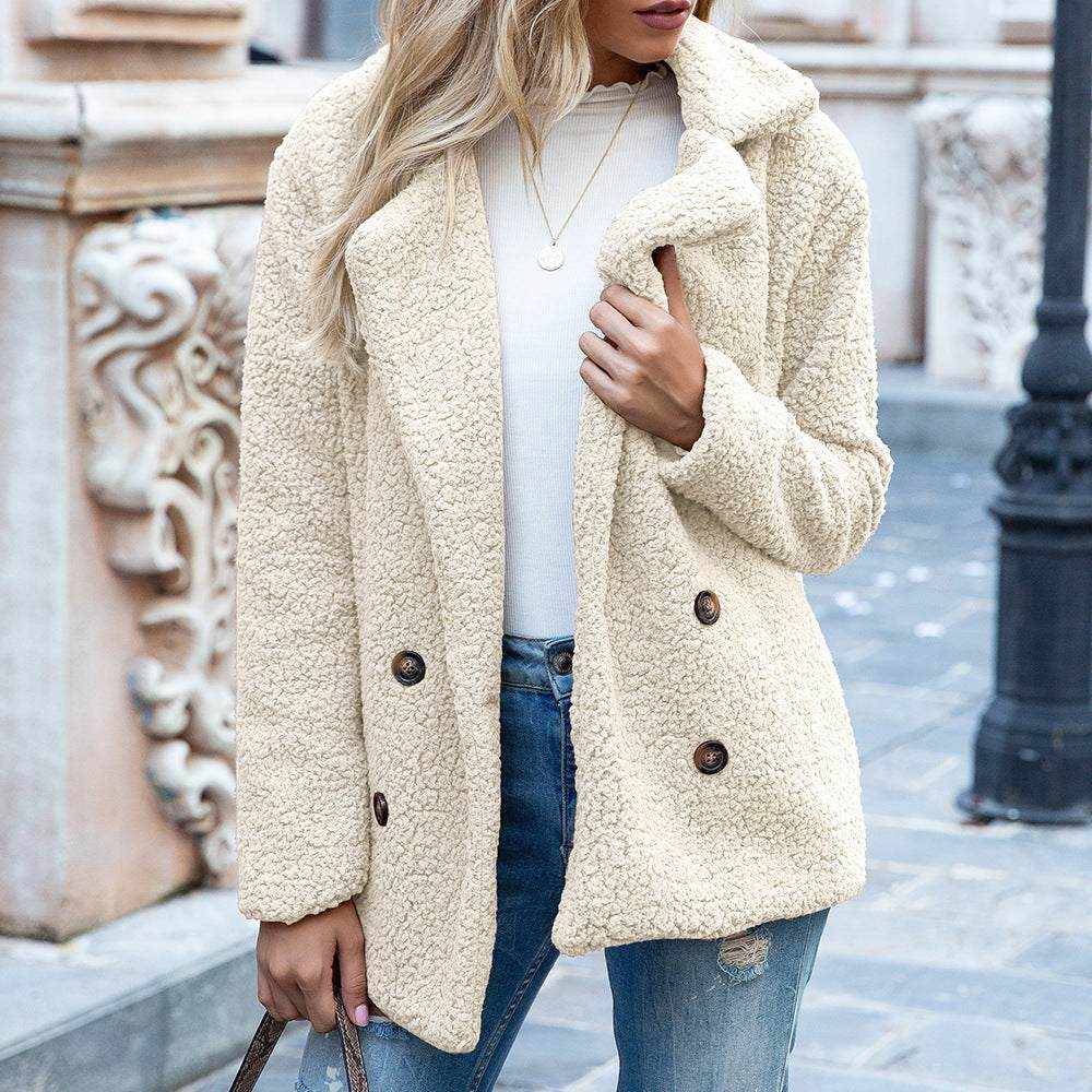 woman wearing beige fluffy coat winter jacket with buttons outdoors