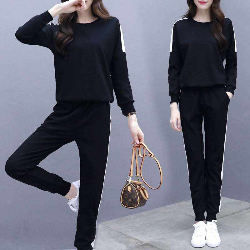 Black Korean style sportswear suit with hoodie and white side stripes on pants