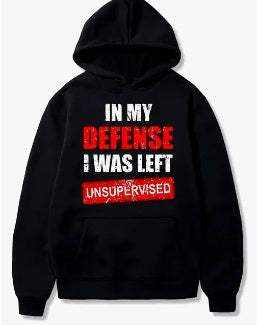 Black men's polyester hoodie with "In My Defense I Was Left Unsupervised" text design
