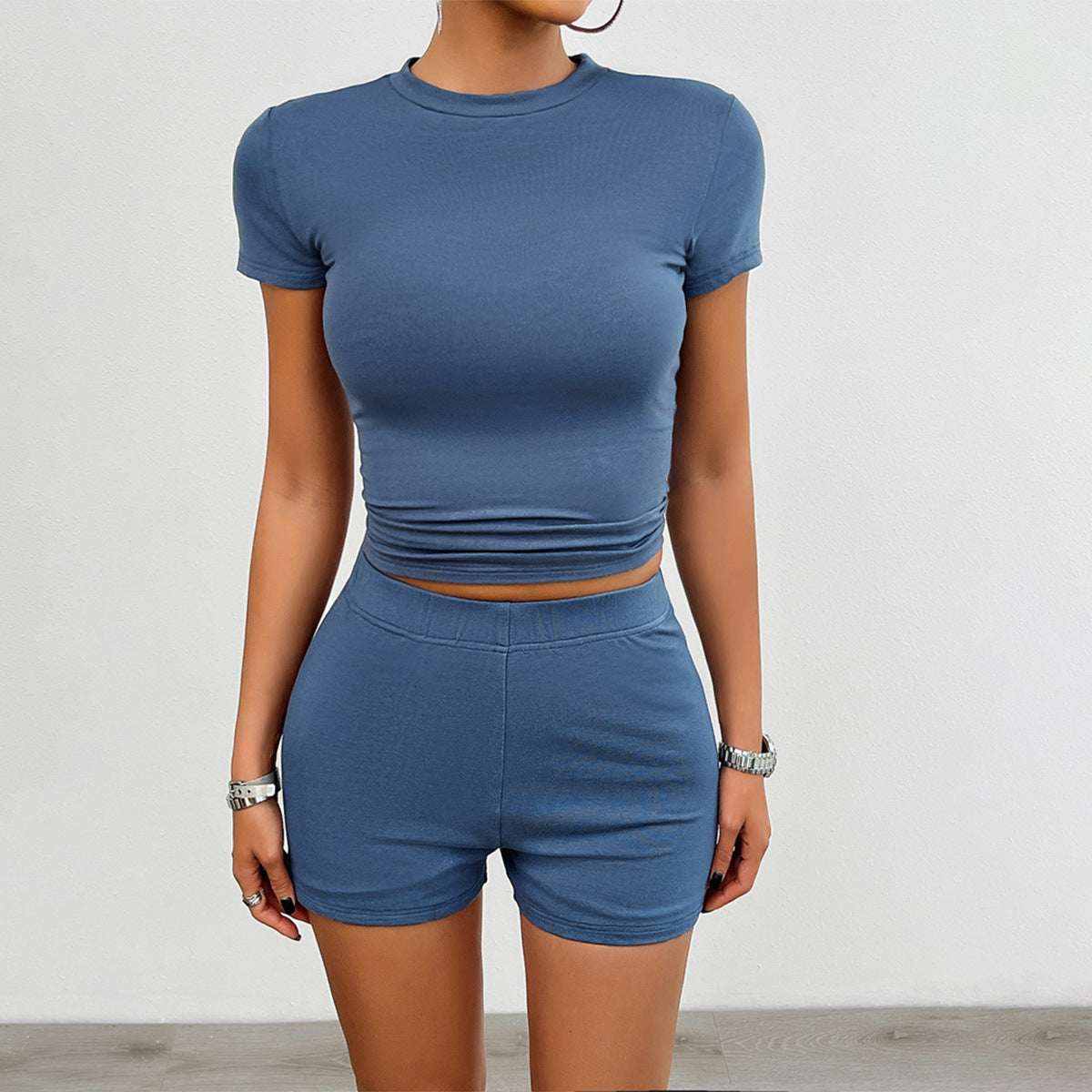 Women wearing blue 2Pcs short-sleeved crop top and matching shorts set