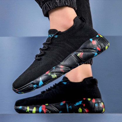 Black Bolt Sneaker black athletic shoes with colorful splatter sole design