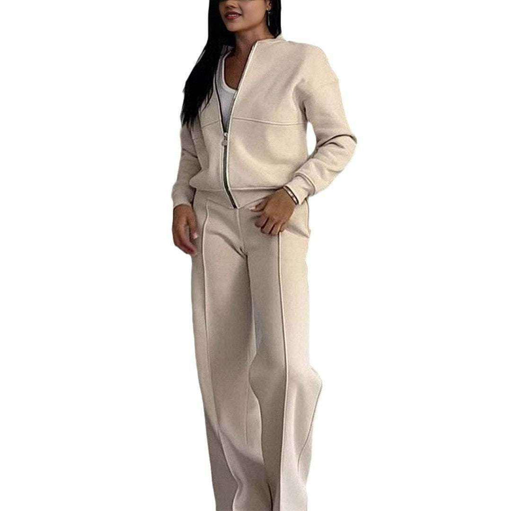 Woman wearing beige leg pants two-piece set with zip-up jacket and wide-leg pants