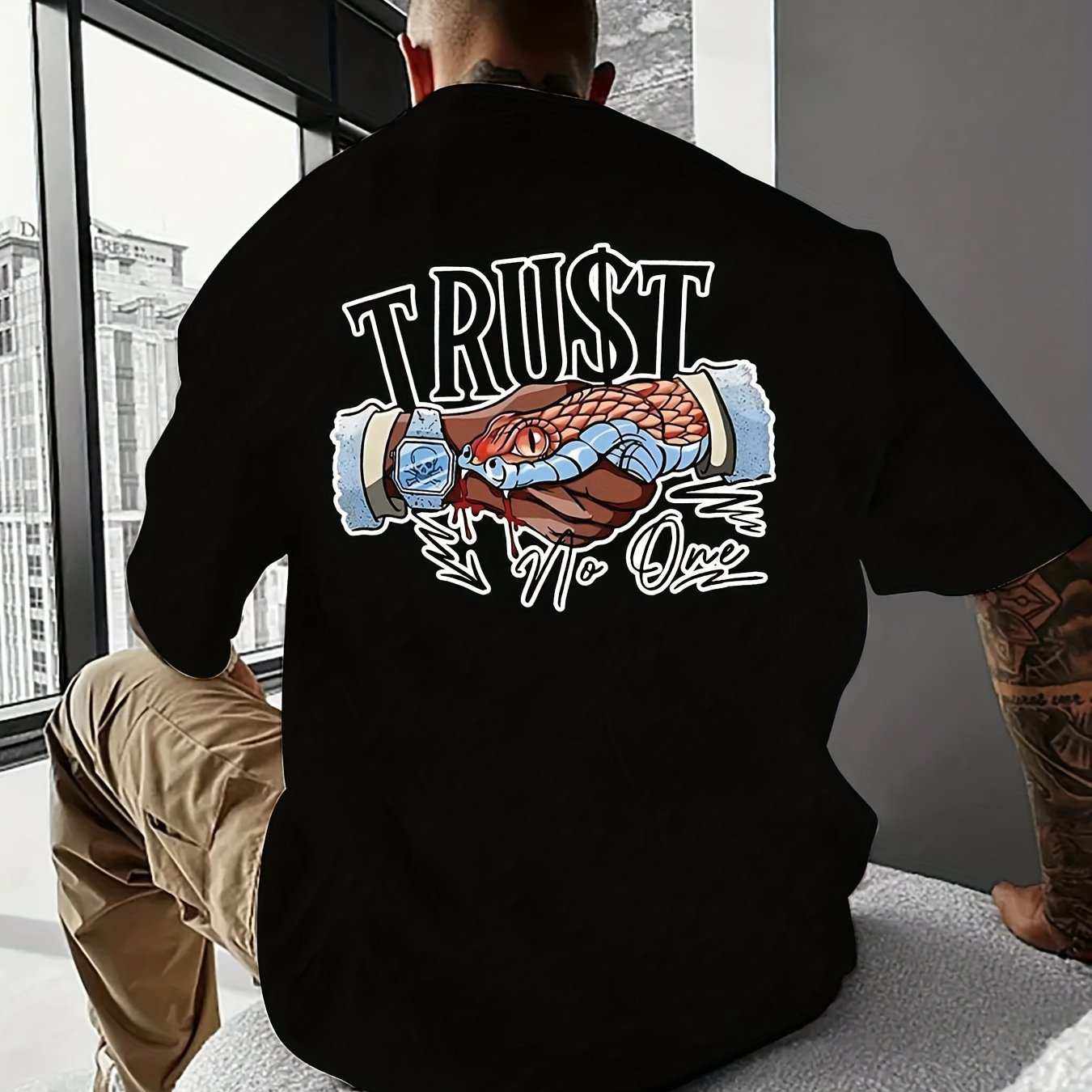 Creative Summer T-shirt black with bold "TRUST No One" snake graphic print on back, short sleeved retro style for leisure outings