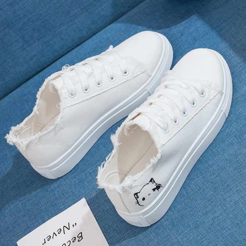 Canvas White SneakersMENS SNEAKERSROBS FASHIONSWEAR 114'SROBS FASHIONSWEAR 114’SCanvas White Sneakers