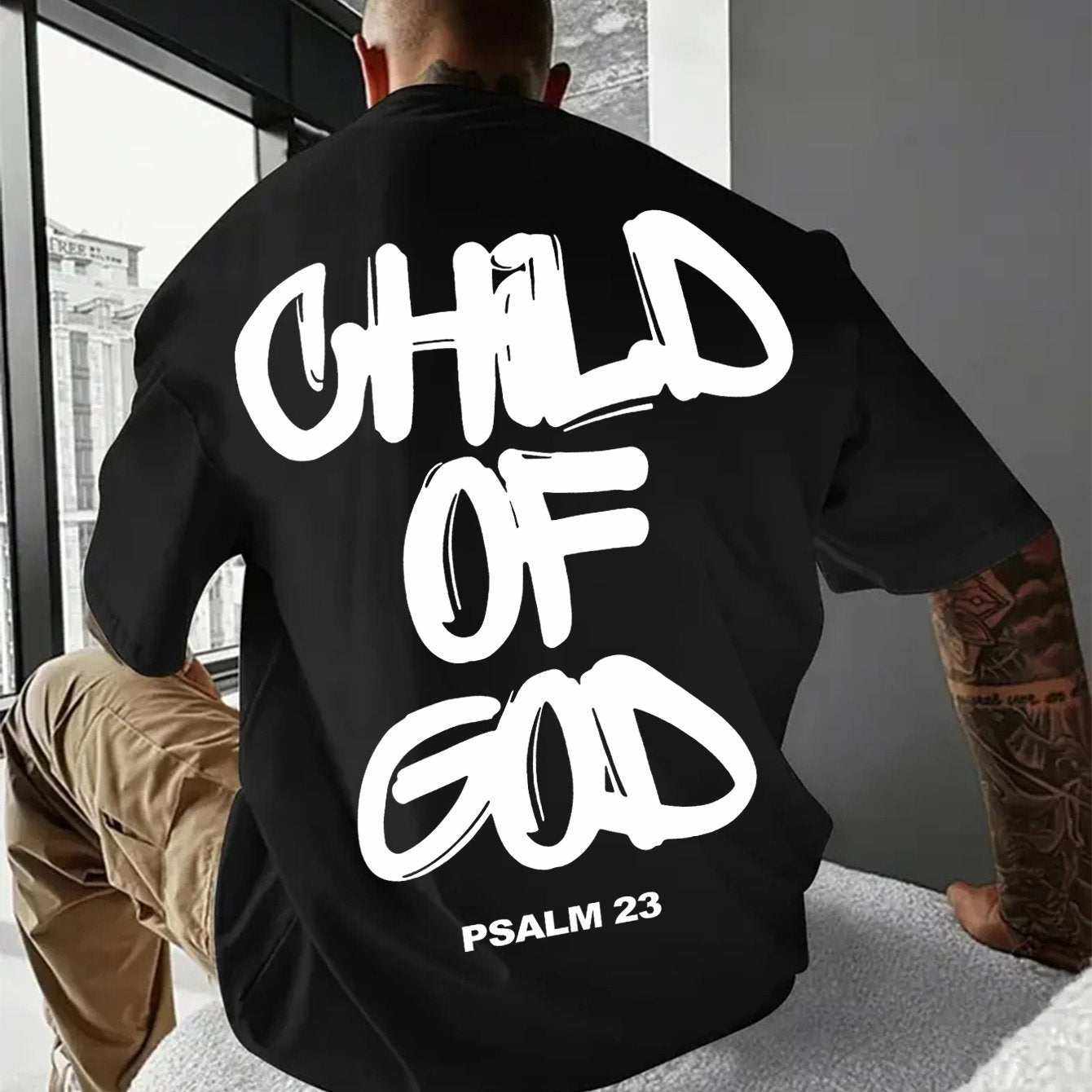 Black short-sleeve Child Of God T-Shirt with bold white print and Psalm 23 text, retro style leisure wear