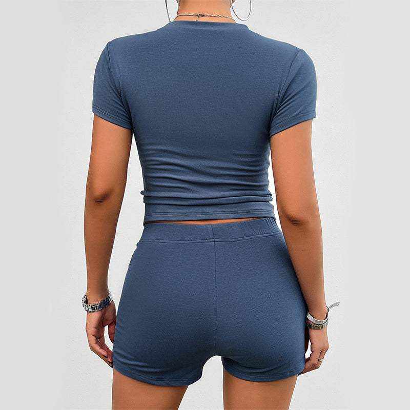 Woman wearing blue 2Pcs short-sleeved crop top and matching shorts set, back view